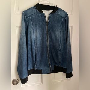 North Face stretchy “Jean” looking zip up jacket.